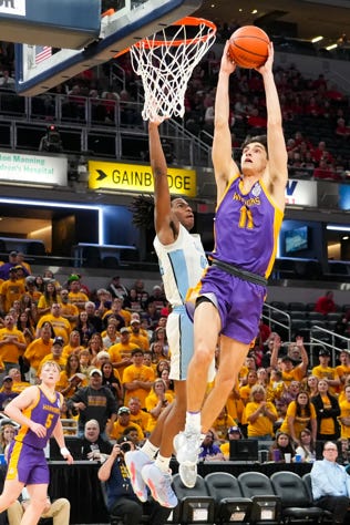 Scottsburg Warriors Jack Miller (11) dunks the ball against the South Bend St. Joseph Huskies on Saturday, March 30, 2024, during the IHSAA boys basketball Class 3A state championship game at Gainbridge Fieldhouse in Indianapolis. The Scottsburg Warriors defeated the South Bend St. Joseph Huskies 67-57. Joe Timmerman/IndyStar